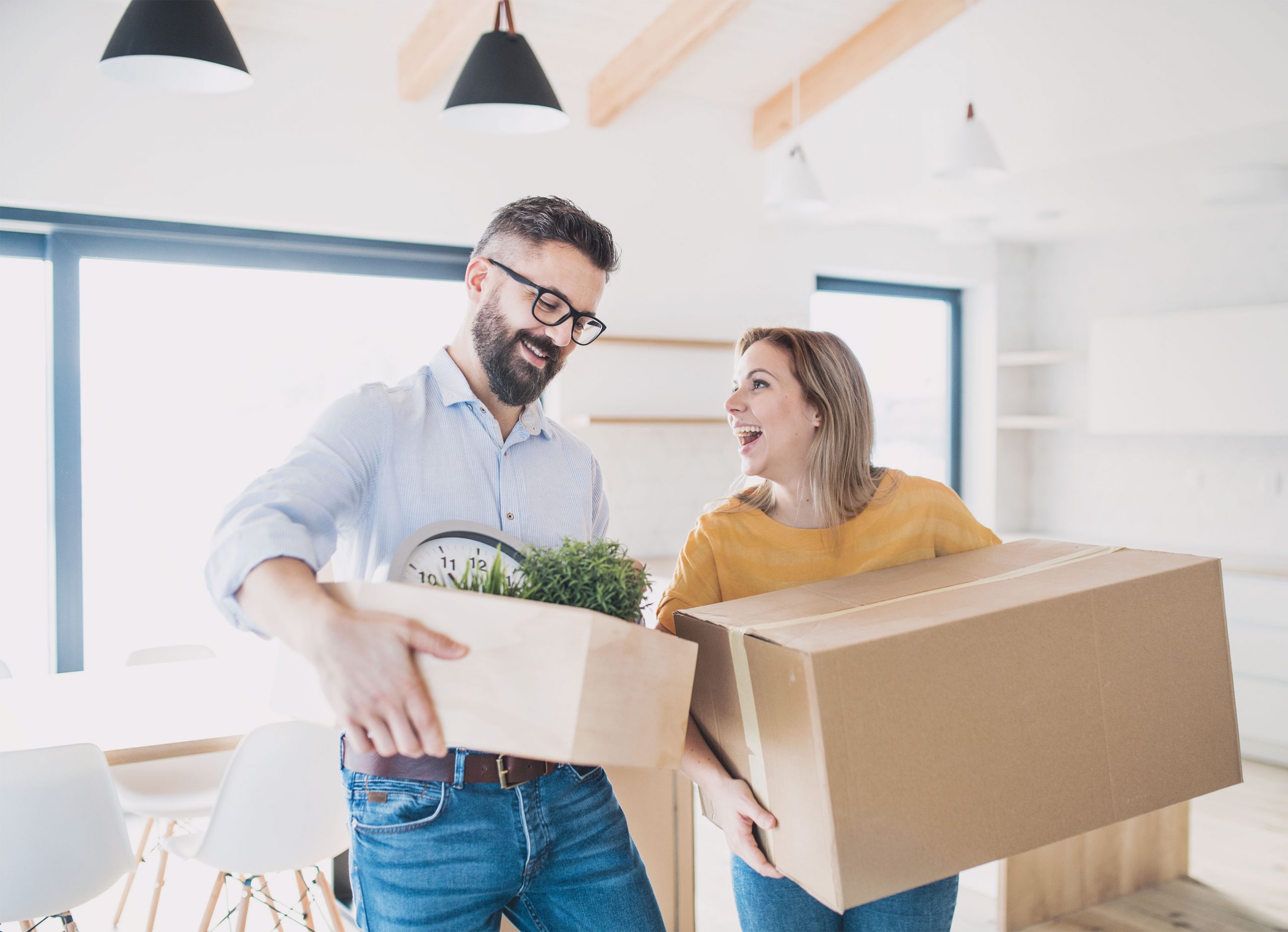 real estate - couple moving into home