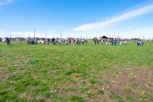 kids hunting easter eggs